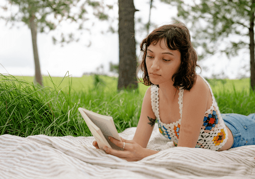 a woman reading 6 therapist-recommended avoidant-attachment books